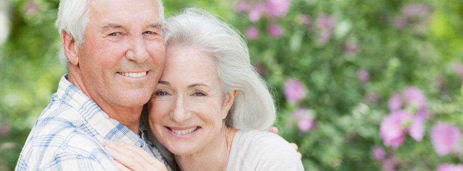 senior couple with dental implants