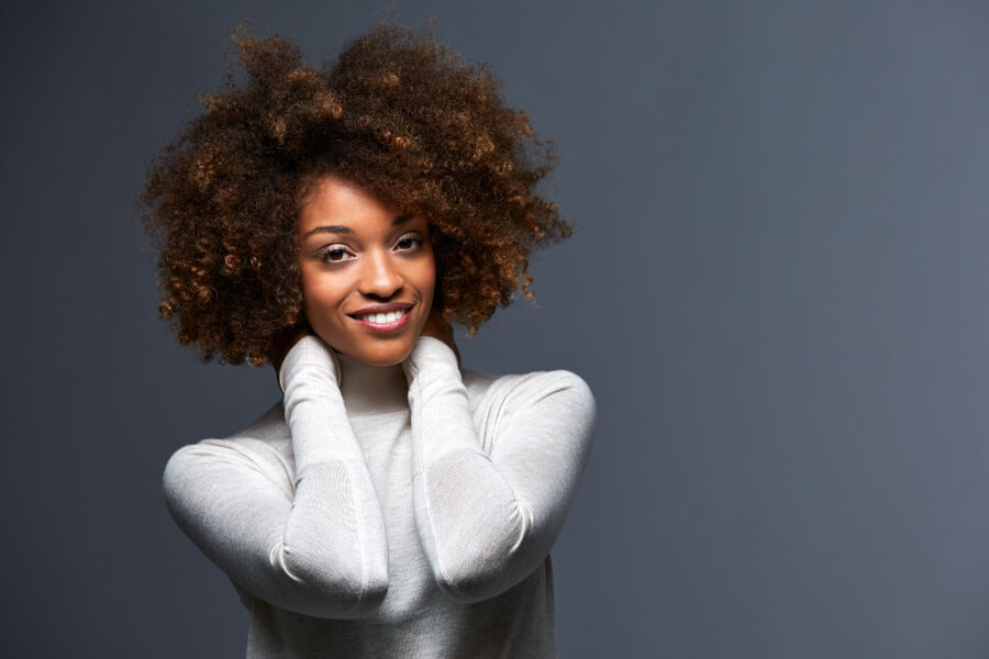 Pretty smiling black woman.